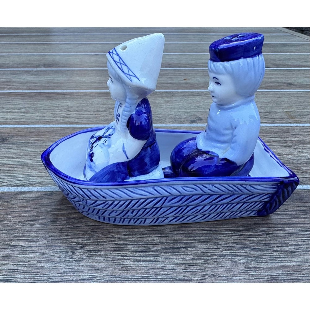 Delft Blue Hand Painted Dutch Boy and Girl in Boat Salt and Pepper Shaker Set